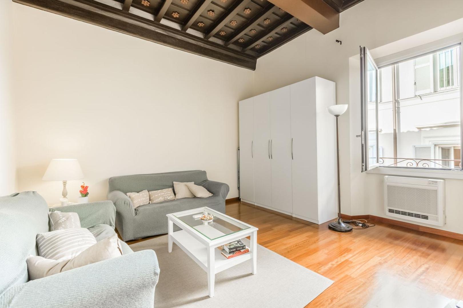 The separate living room, with its sofas