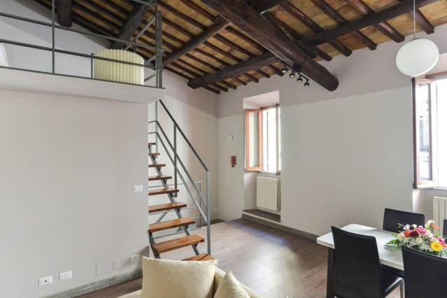 The living room seen from the far end, showing the full height of the room